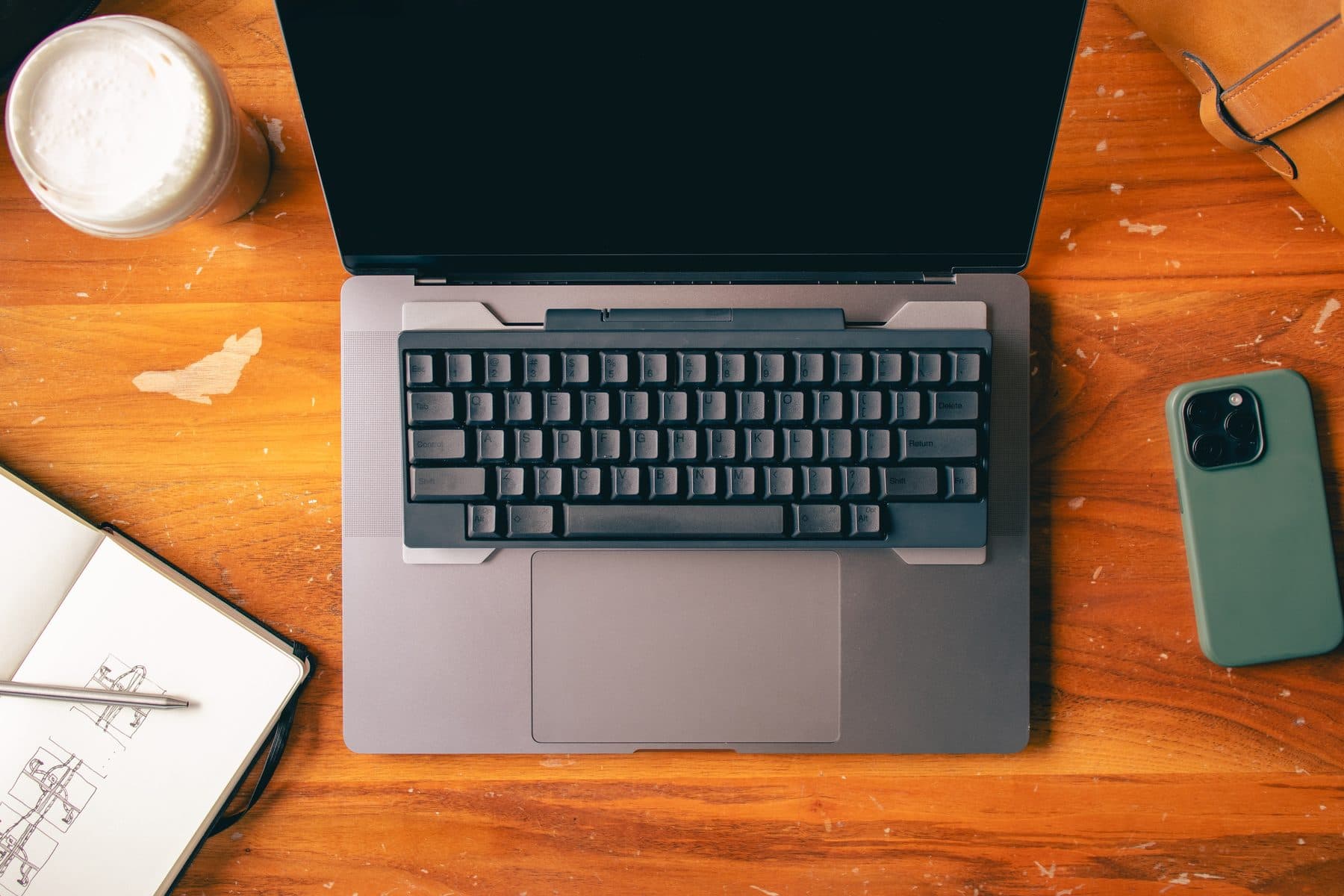 keybridg keyboard bridge shown in use on a desk